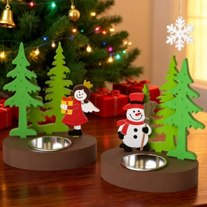 Close-up of wooden Christmas candle holder featuring angel and snowman on rustic table