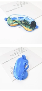 Detail of Van Gogh oil painting sleep mask showing silk texture and elastic strap