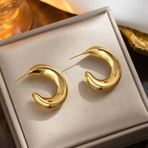 Minimalist gold-plated C-shaped stainless steel hoop earrings in a luxury jewelry box