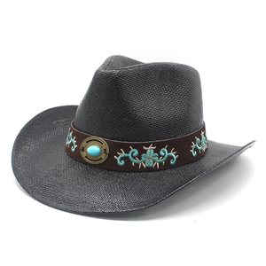 Dark brown straw cowboy hat with turquoise embroidery and vintage metal ornament
