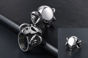 Detailed views of punk ram horn skull ring in polished silver steel from multiple angles