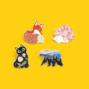 Cute enamel animal pins set featuring a red fox, hedgehog, black cat, and forest bear