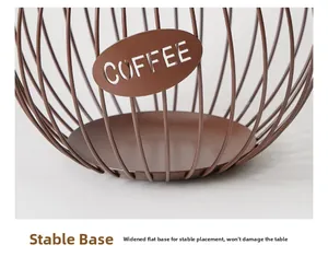 Stable flat round base of the brown metal coffee pod holder with hollow coffee text