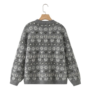 Gray oversized Fair Isle knit sweater with snowflake and heart patterns for a cozy winter style