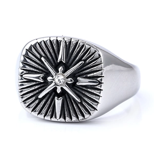 Vintage silver punk cross ring with a round zircon stone and starburst texture