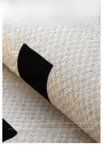 Macro detail of plush high-density pile and soft texture of this modern area rug