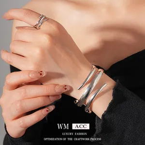 Minimalist silver geometric spiral ring and open cuff bracelet jewelry set for women