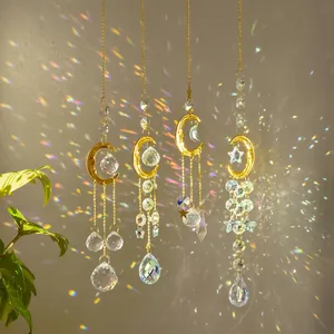 Golden suncatcher set with moon and star metal frames and hanging crystal prisms for garden deco