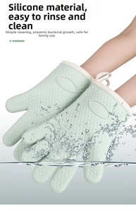 Waterproof silicone oven mitt in mint green featuring non-slip heart texture for kitchen