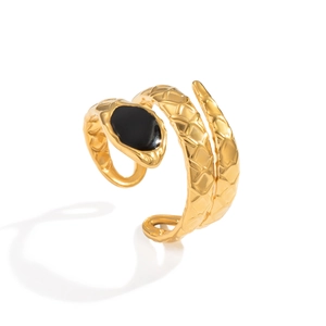 Detail of adjustable gold snake ring with textured scales and black enamel waterdrop eyes