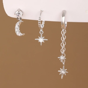 Elegant silver star and moon earrings set with zircon stones and long tassel chains