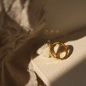 Gold dragon scale texture ring with irregular crushed ice foil design in titanium steel