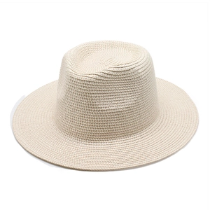 Classic beige straw boater hat with fine weave texture and sun protection brim