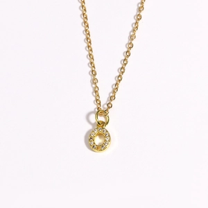 Elegant gold necklace with a sparkling rhinestone-encrusted circular pendant for women