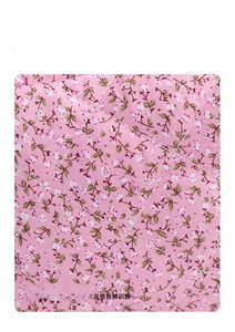 Detail showing high-quality pink floral fabric with elegant diamond-quilted stitching