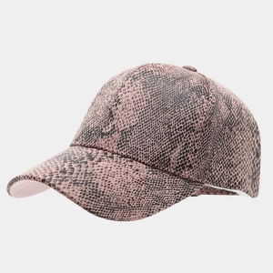 Detail of pink and black snakeskin pattern on a six-panel synthetic leather baseball cap