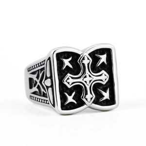 Retro stainless steel punk ring featuring embossed star and cross patterns on silver-black band