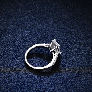 Rectangle cut moissanite engagement ring in sterling silver with pave set diamond band