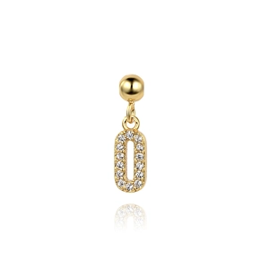 Macro detail of gold S925 silver pendant in number 0 shape with sparkling cubic zirconia