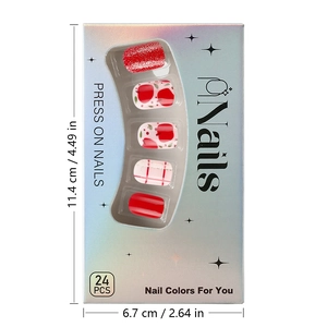 Detailed view of red and white Christmas press-on nails set in iridescent box packaging