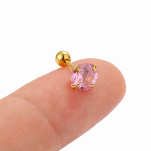 Pink cubic zirconia gold stud earring with screw back closure on fingertip display