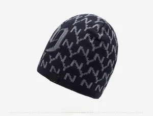 Detailed knit texture and embroidered logo on warm winter fleece-lined hat