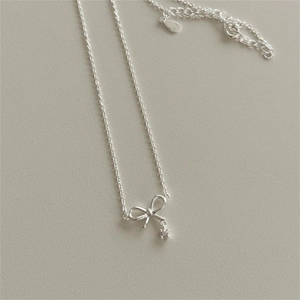 Minimalist S925 sterling silver bow necklace with sparkling zircon pendant for women
