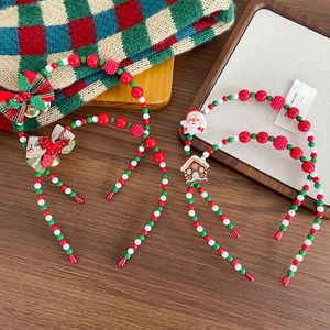 Handmade beaded Christmas headband featuring Santa Claus, reindeer and festive bells