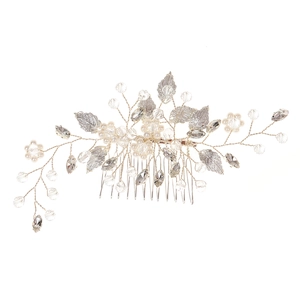 Silver leaf bridal hair comb with pearls and clear crystal beads on white background