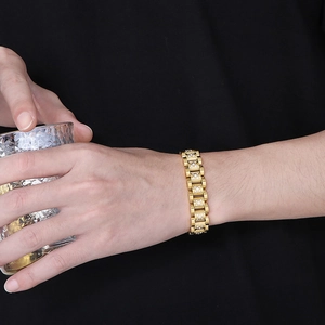 Close-up of a gold-plated hip-hop watch band bracelet with sparkling CNC set diamonds