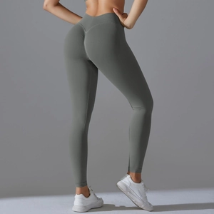Macro detail of high-waist seamless scrunch butt leggings in dark grey sport fabric