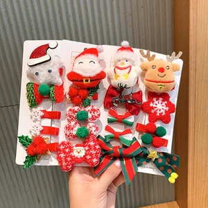 Cute Christmas hair clip set with plush reindeer snowman and bow designs for girls