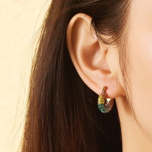 Chic 18K gold plated hoop earrings featuring vibrant rainbow rhinestones on model