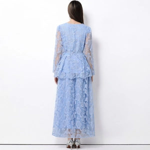 Back view of light blue lace two-piece dress set with tie waist and flared hem