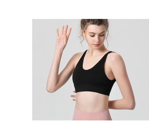 Close-up of black sports bra with wide straps and high-support design for gym running