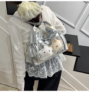 Silverita large capacityita bag with clear window and star plush charm on model back