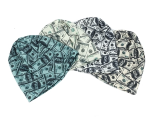 Detailed view of four beanie hats featuring diverse color dollar bill banknote prints