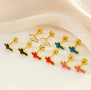 Macro detail of cross stud earrings with colorful enamel inlay and secure screw-back design