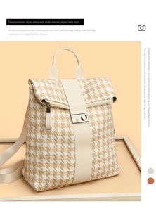 Details des modischen Rucksacks mit Hahnentrittmuster, Silberverschluss und Lederbesatz