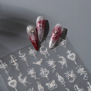 Holographic Chinese style nail stickers featuring moons and butterflies on gradient nails