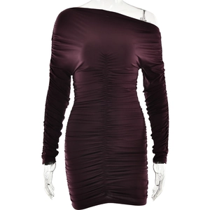 Detail of burgundy off-shoulder long sleeve dress with ruched slim fit texture