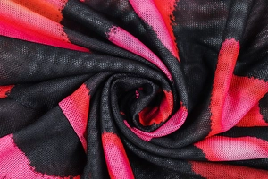 Detailed macro view of breathable mesh fabric featuring abstract pink and black stripes