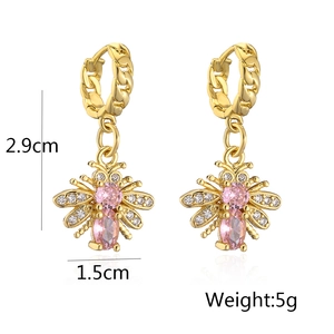 Detail of gold-plated bee earrings with pink stones and cubic zirconia, 2.9cm x 1.5cm size