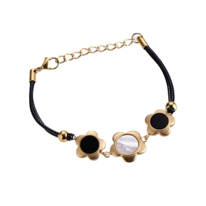 Double-layered 18k gold plated flower bracelet with black cord and seashell inlays