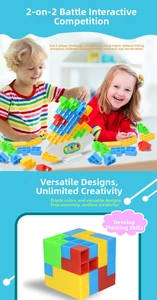 Close-up of kids playing with colorful 3D balancing blocks on a white base stand