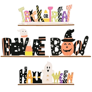 Halloween wooden tabletop decorations featuring Trick or Treat, Boo, and Halloween signs