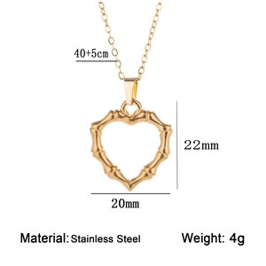 Detail showing dimensions of golden bamboo-textured heart necklace in stainless steel