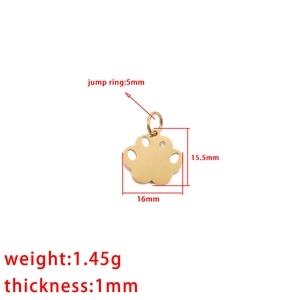 Gold stainless steel paw print pendant with crystal detail and sizing measurements