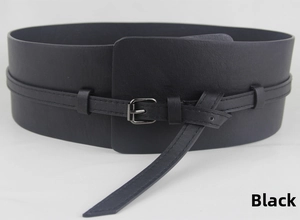 Detail of a black wide waist belt featuring a dual-layer design and silver metal buckle