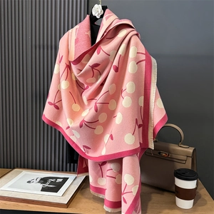 Pink cashmere-feel knit scarf featuring cute double-sided cherry patterns and fringes